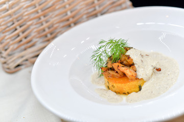 Ukrainian pumpkin dish on a white plate