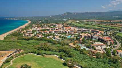 Fototapeta premium Aerial drone photo of famous sandy deep turquoise and blue exotic beach of Navarino in Messinia, Peloponnese, Greece