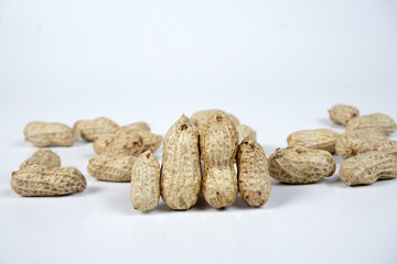 Fototapeta na wymiar peanuts on white background
