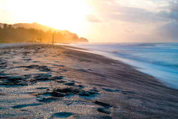 Beautiful sunset and black sand in Palomino, Colombia