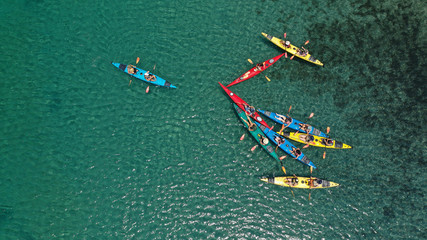 Aerial drone photo of colourful sport canoes operated by young athletes competing in Mediterranean...