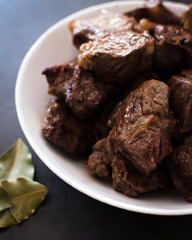 cooked beef meat on a plate
