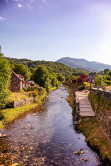 Fototapeta premium View of the river Audressein village in the department of Ariège, in the Pyrenees, Occitanie region, France