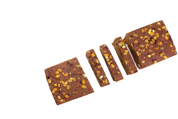 Bread with nuts and dried fruits, prunes, dried apricots, raisins and seeds on isolated white background