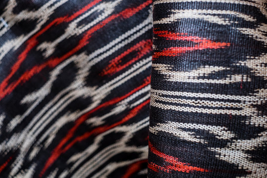Roll of hand woven T'nalak cloth, made from organic Abaca plant fibers. Plant based textile. Animal free product. Selective focus. Copy space.