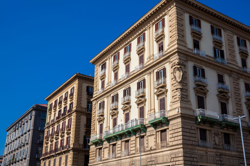 Beautiful facades of the antique buildings in Naples old city