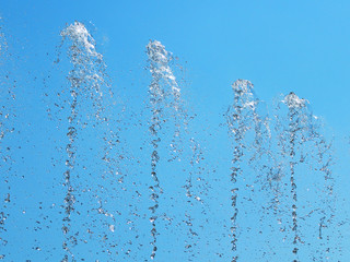 jet fountain on blue sky background texture background