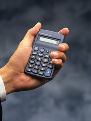 hand with calculator