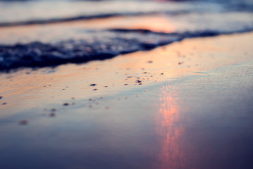 A sunset on the beach. Sea and eveninig sky with clouds
