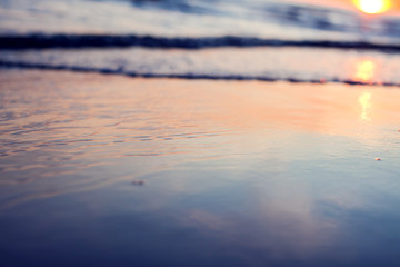 A sunset on the beach. Sea and eveninig sky with clouds