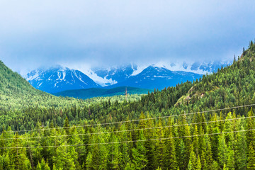 The North-Chuyskiy ridge and power lines. Gorny Altai, Russia