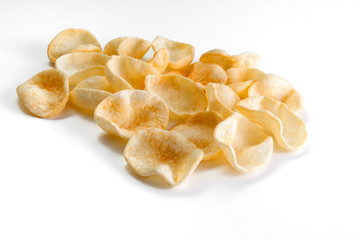 Potatoes snack with pepper on isolated white background. Closeup