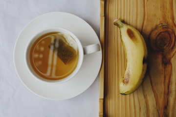 Green tea white Cup and banana