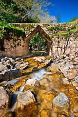  The ancient corbel arch bridge (probably hellenistic - 3rd century BC), in the archaeological site...