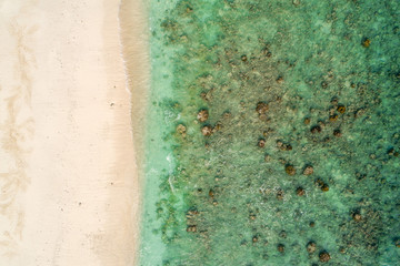 Aerial top view beautiful sea landscape, beach and wave with turquoise sea water with copy space