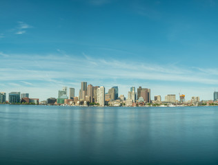 Long Exposure View of Boston Skyline With Mostly Clear Skies