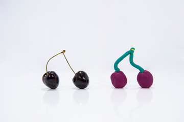 Comparison of two cherries - Real and Fake.