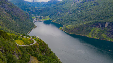 Fototapeta na wymiar Aerial panorama view to Geiranger fjord and town from Trollstigen at Norway