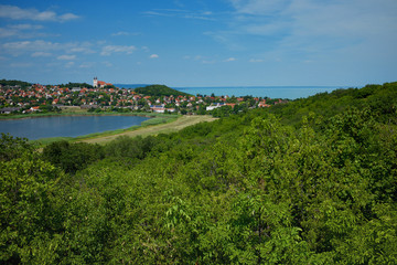 Fototapeta na wymiar Tihany village and the abbey with the inner lake and forest in the foreground and lake Balaton in Hungary.
