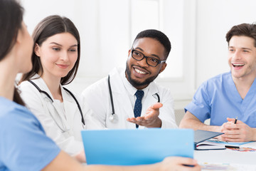 Medical staff having discussion in modern hospital