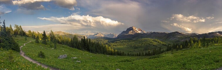 Dramatic Stormy Sky and Wide Panoramic Landscape of Healy Pass Meadows on a great summertime hiking trail in Canadian Rocky Mountains, Banff National Park