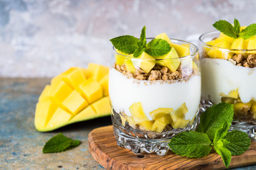 Parfait with yogurt, mango and granola.