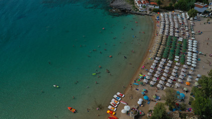 Aerial drone photo of famous organised sandy paradise beach of Kalogria in the heart of Messinian Mani next to iconic village of Stoupa, Peloponnese, Greece