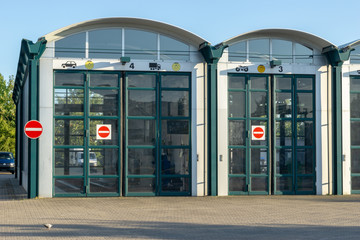 building of technical supervisory association for cars - hall with large doors