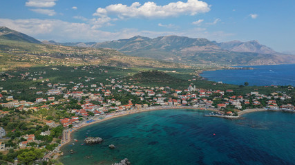 Fototapeta na wymiar Aerial drone panoramic photo of iconic picturesque village and sandy beach of Stoupa in the heart of Messinian Mani, Peloponnese, Greece