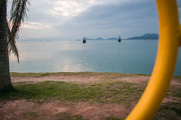 sunset on the beach with boats