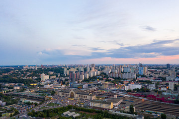 Obraz premium Aerial view of old trains on the railway station. Top view from flying drone in Kiev. Ukraine