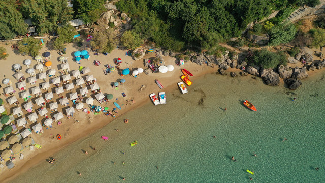 Aerial drone photo of famous organised sandy paradise beach of Kalogria in the heart of Messinian Mani next to iconic village of Stoupa, Peloponnese, Greece