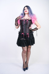 Portrait of a beautiful woman in gothic punk corset