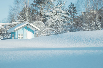 Winter landscape on a sunny day toned in blue