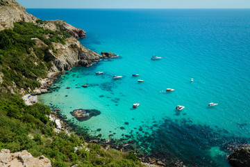 Yachts in the bay of the blue tropical sea