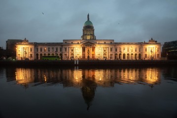 Fototapeta na wymiar Lit up Custom house in Dublin during evening