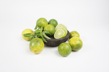 limes on white background