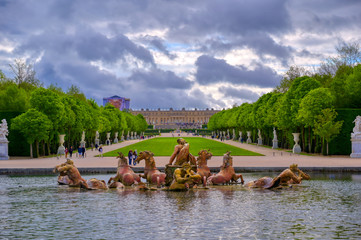 Versailles, France - April 24, 2019: Fountain of Apollo in the garden of Versailles Palace on a...