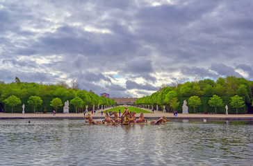 Versailles, France - April 24, 2019: Fountain of Apollo in the garden of Versailles Palace on a...