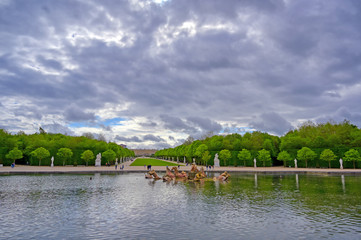 Versailles, France - April 24, 2019: Fountain of Apollo in the garden of Versailles Palace on a...