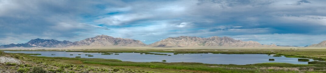 USA, Nevada, Nye County, Wayne E. Kirch Wildlife Management Area. Panorama of Adams-MgGill Reservoir along the White River. This is a small tributary of the Colorado River