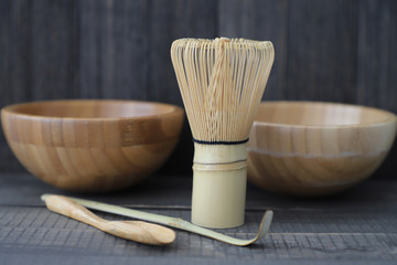 Fototapeta na wymiar autenthic matcha tea set. dishes for matcha - wooden spoon, whisk, scoop, cup.