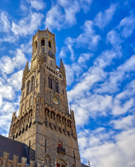 Fototapeta na wymiar The Belfry of Bruges located in the Market Square of Bruges (Brugge), Belguim.