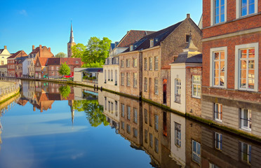 The canals of Bruges (Brugge), Belgium on a sunny day.