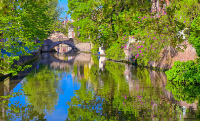 The canals of Bruges (Brugge), Belgium on a sunny day.