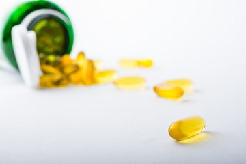 Vitamin, essential oils, dietary supplement yellow pills