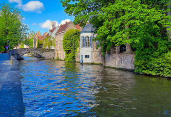 The canals of Bruges (Brugge), Belgium on a sunny day.