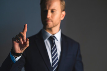 elegance caucasian Successful businessman  with beard close up wear formal suit tie grey background