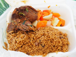 Dominican Republic-food bought in a street cafe. Rice with chicken and salad.
