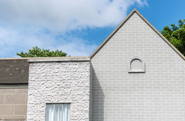 european style house with bright blue sky